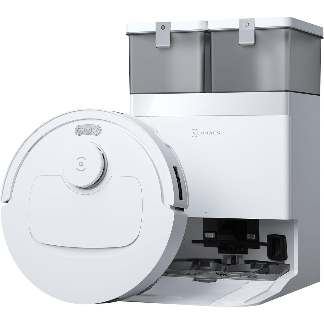 Ensemble robot et base de lavage integrant l'entretien des sols durs et l'entretien des tapis